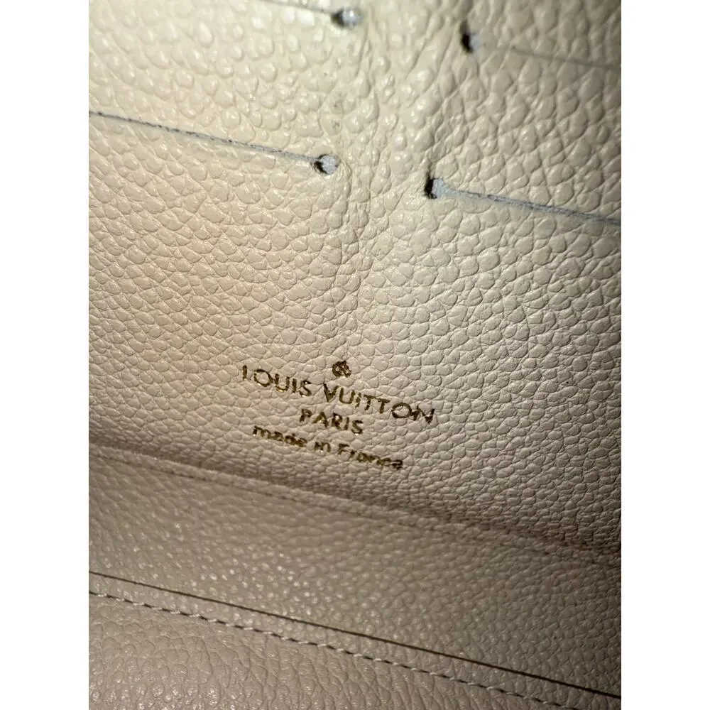 Louis Vuitton Zippy Wallet in Cream Empreinte Leather